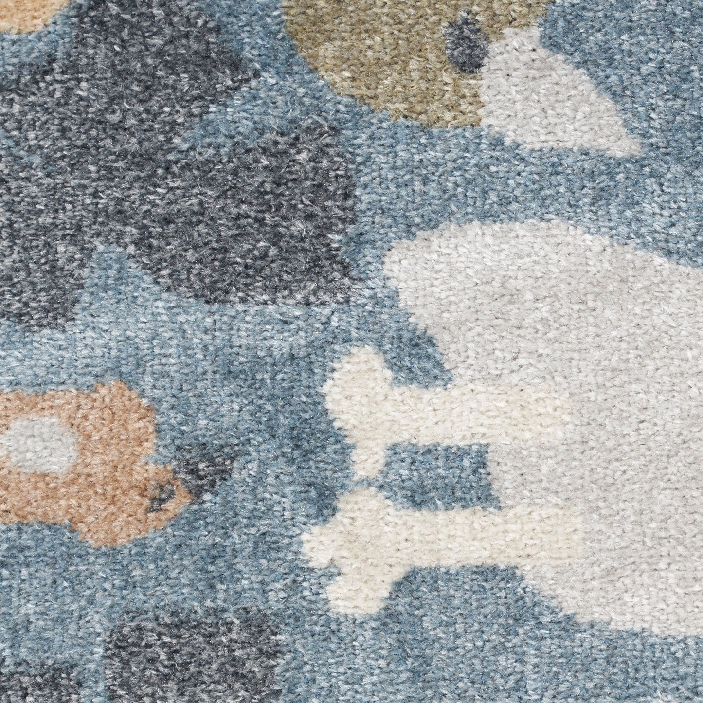 Nourison Astra – maschinenwaschbarer Teppich mit Tiermuster