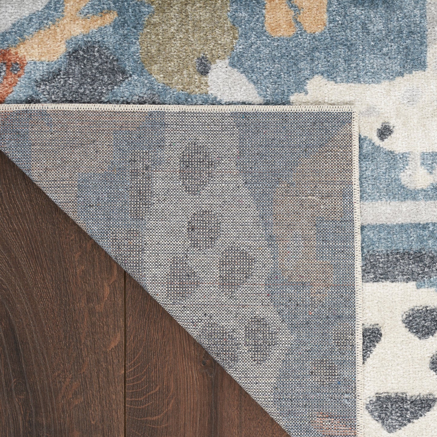 Nourison Astra – maschinenwaschbarer Teppich mit Tiermuster