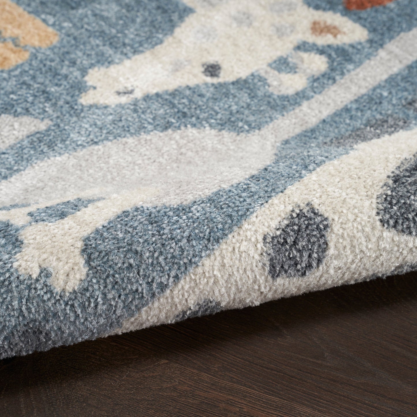 Nourison Astra – maschinenwaschbarer Teppich mit Tiermuster