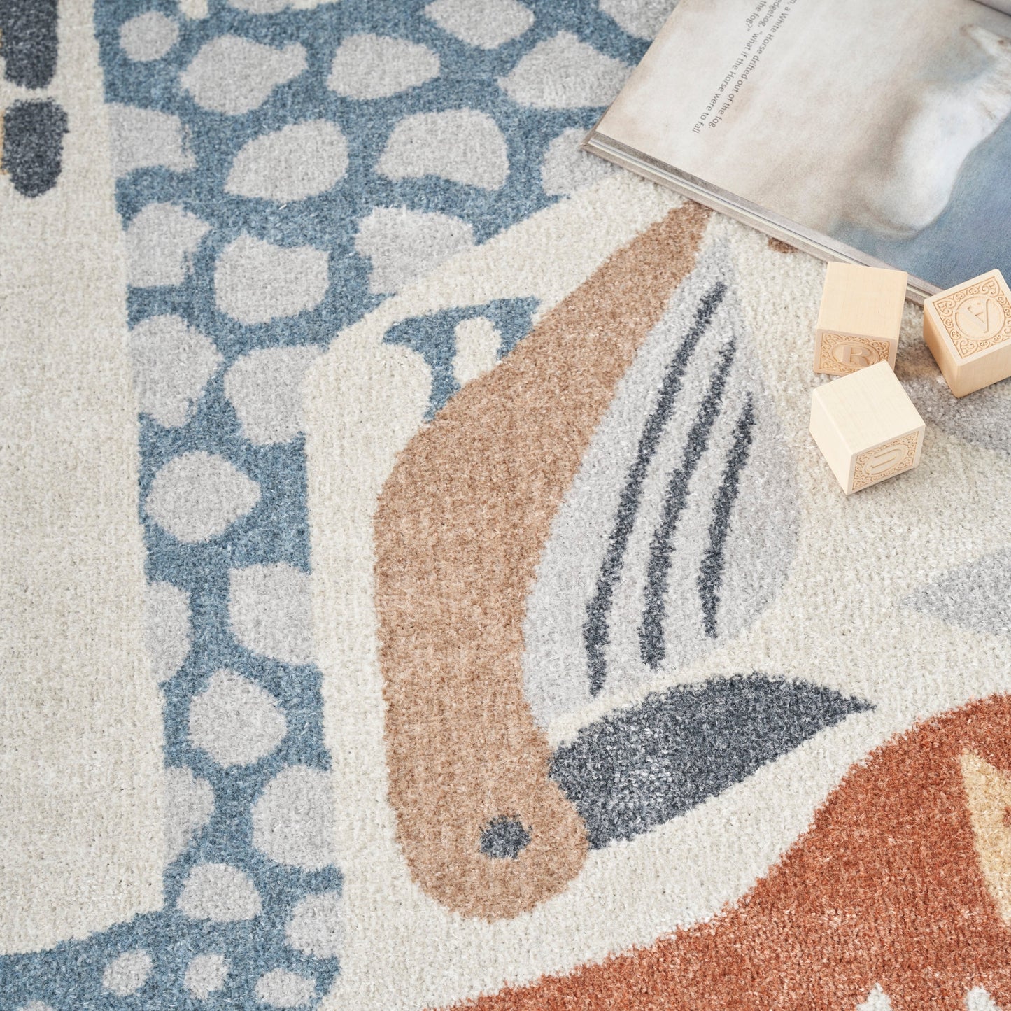 Nourison Astra – maschinenwaschbarer Teppich mit Tiermuster