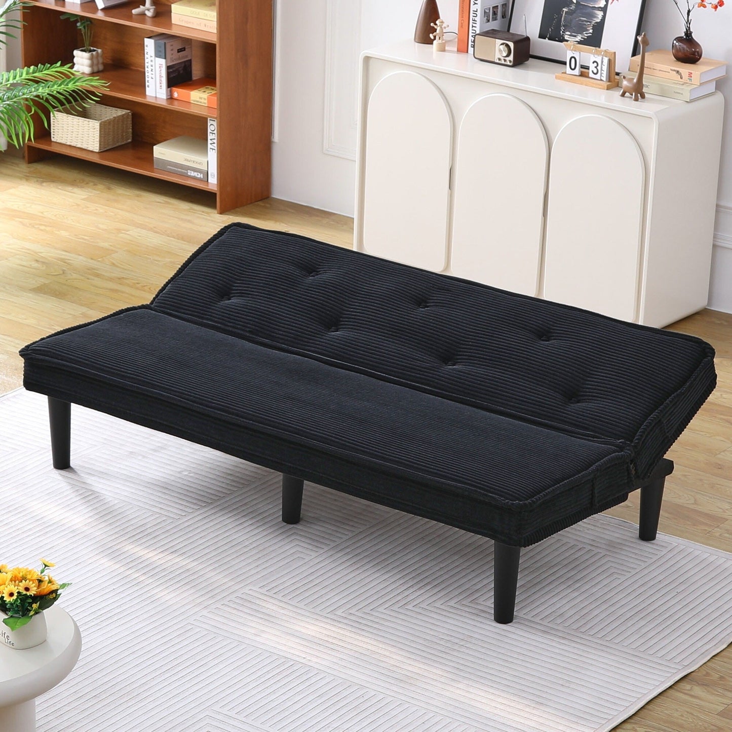 This 66-inch corduroy sofa bed can flexibly adapt to the living room, apartment and bedroom