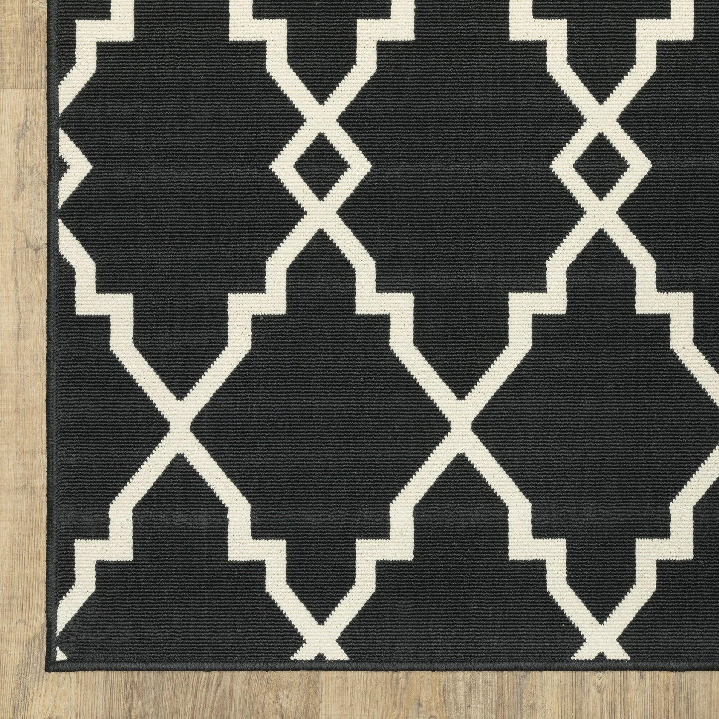 Vista Home Malta Lattice Schwarz/Off-White Teppich für drinnen und draußen.