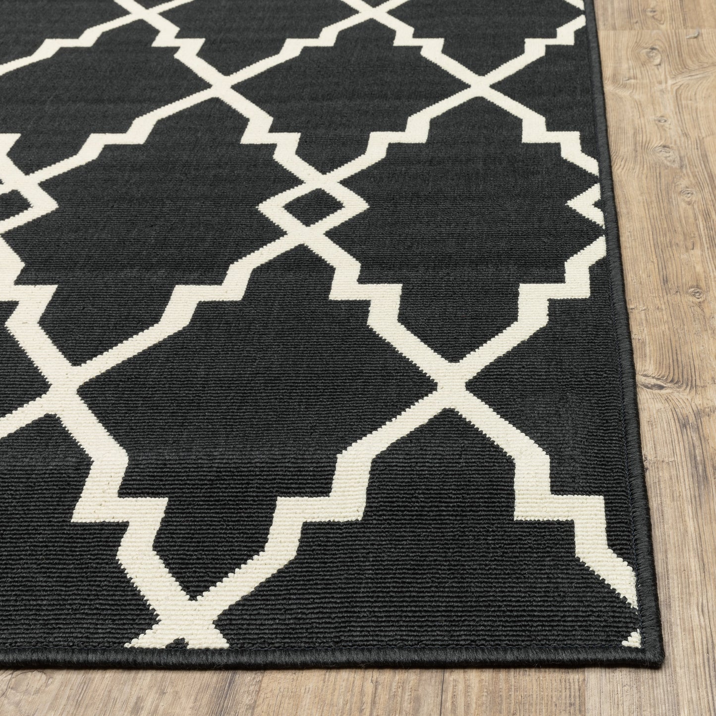 Vista Home Malta Lattice Schwarz/Off-White Teppich für drinnen und draußen.