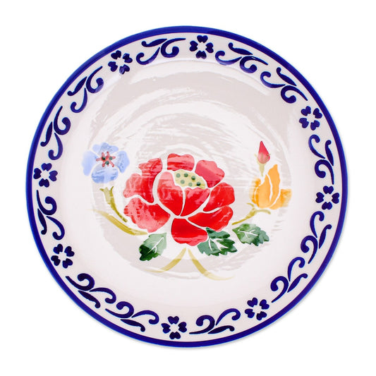 Novica Handgemachter Speiseteller aus Keramik mit Mohngarten in Blau