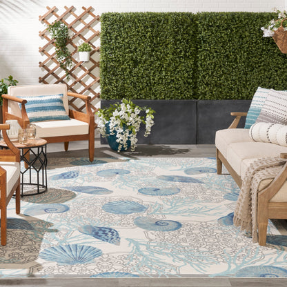 Waverly Sun &amp; Shade Shore Thing Teppich für drinnen und draußen, tropische Muscheln, Blumenmuster